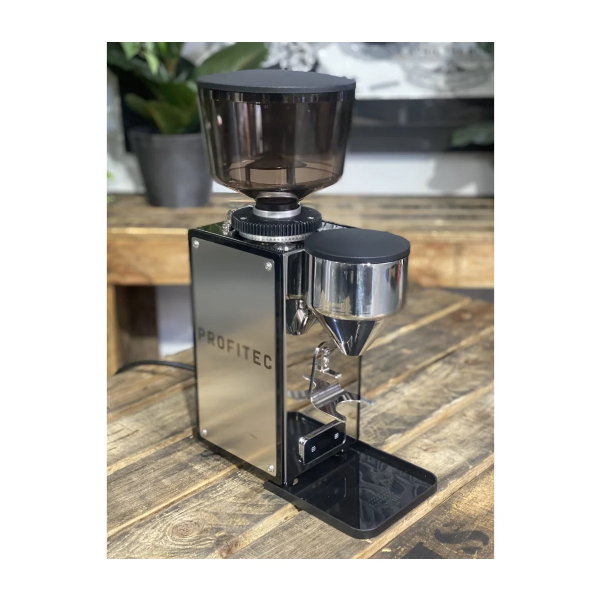 Profitec Pro T64 coffee grinder, stainless steel, three-quarter view